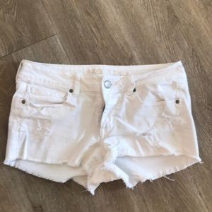 White distressed jean shorts